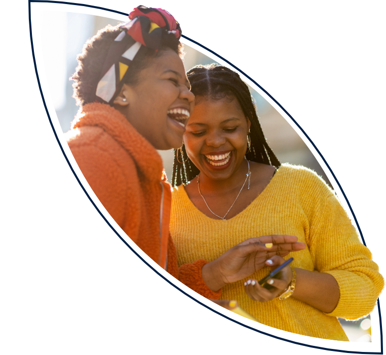 Two friends laughing together